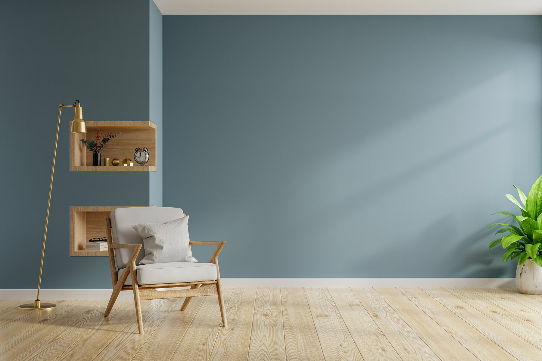 Living room interior with armchair on empty dark blue wall.